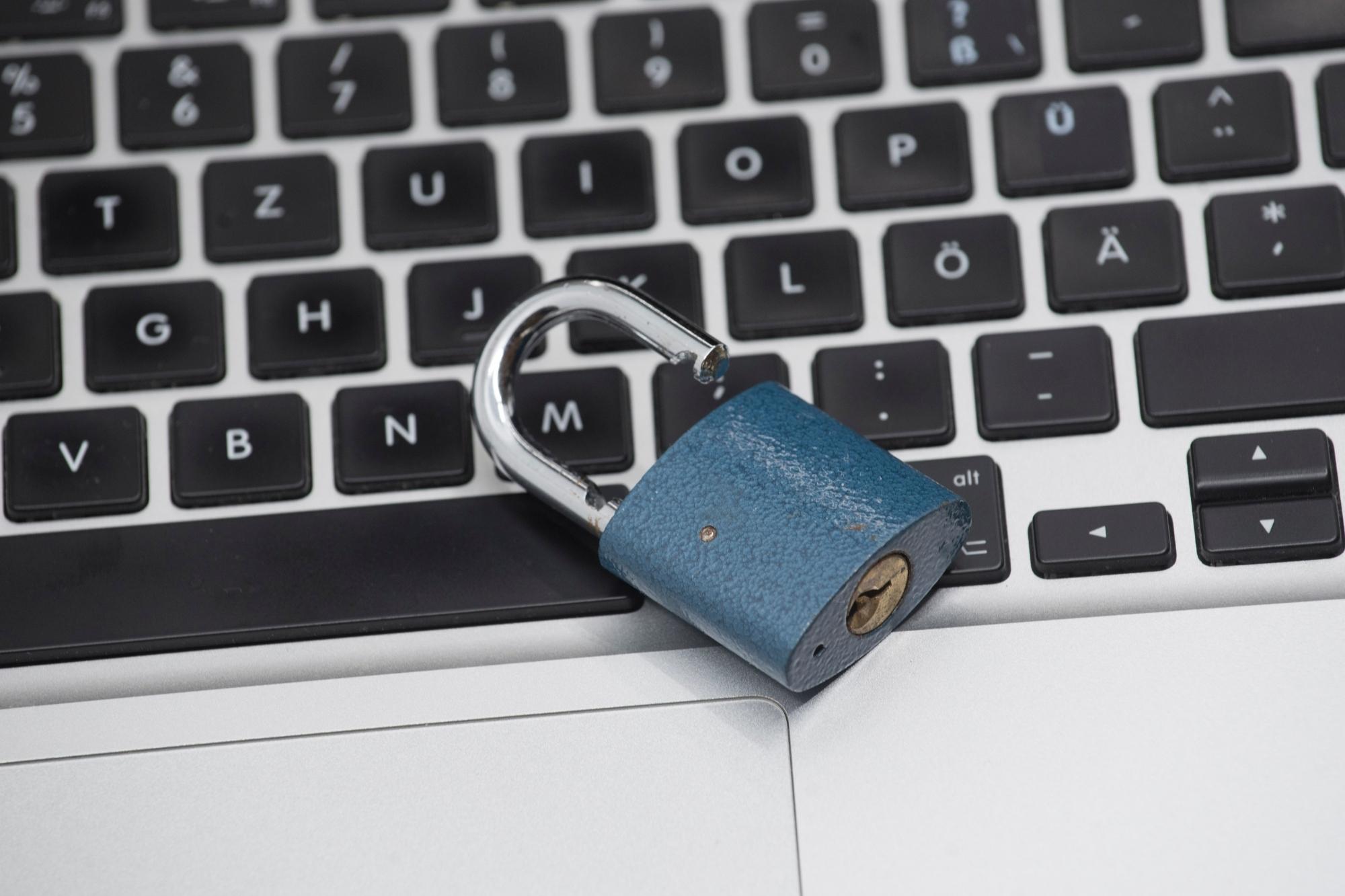 blue lock on top of laptop