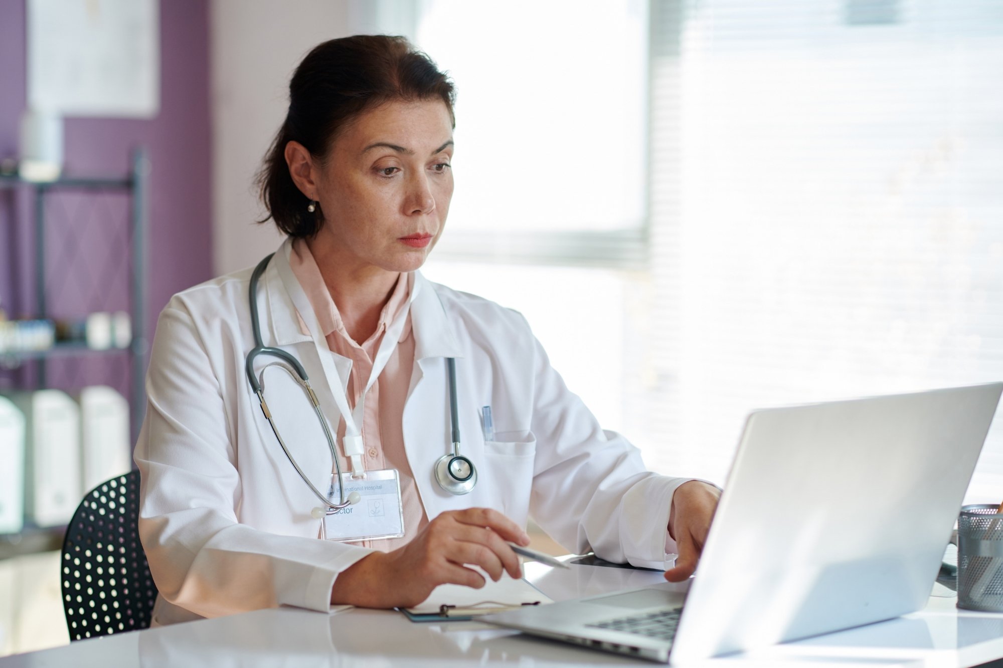 doctor reading a suspicious email