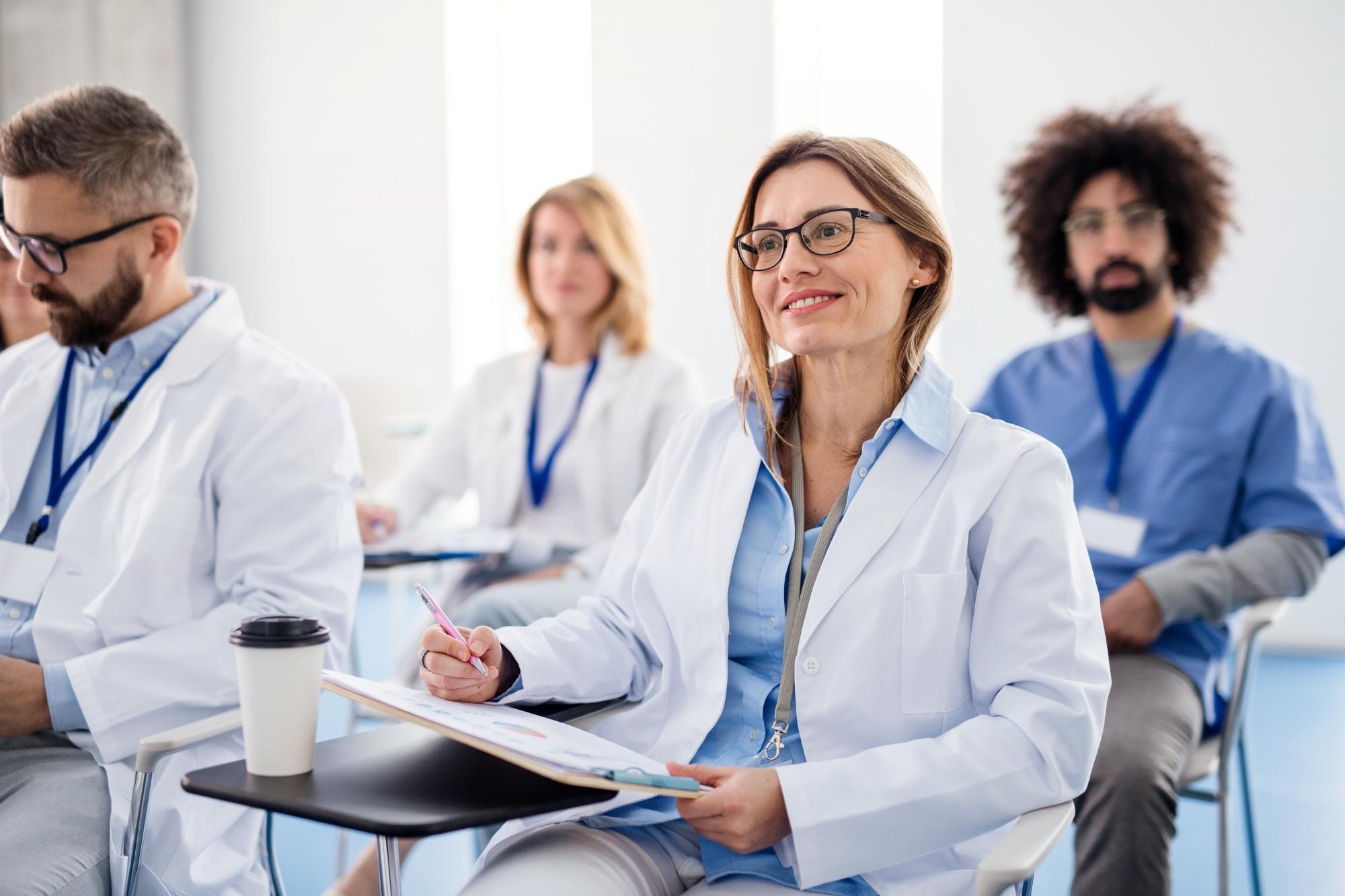 healthcare professionals attending cybersecurity seminar
