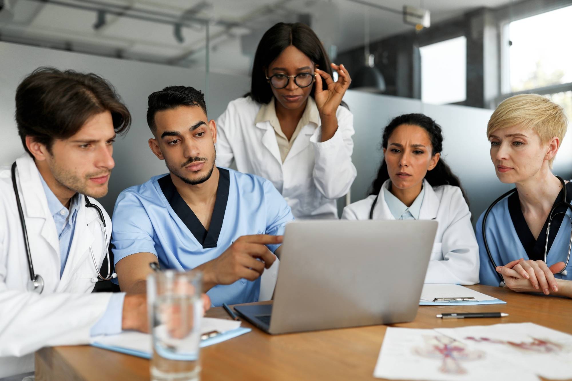 medical practitioners discussing multi factor authentication