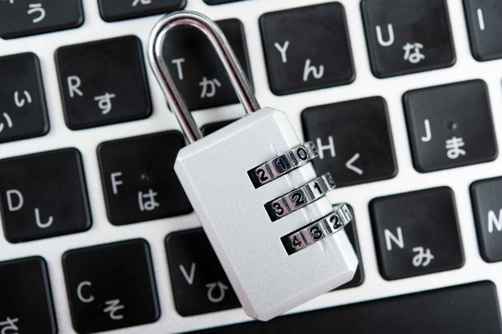 white lock on top of laptop
