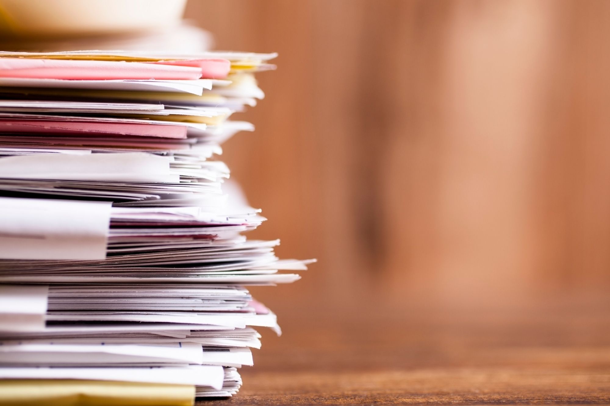 pile of documents in brown background