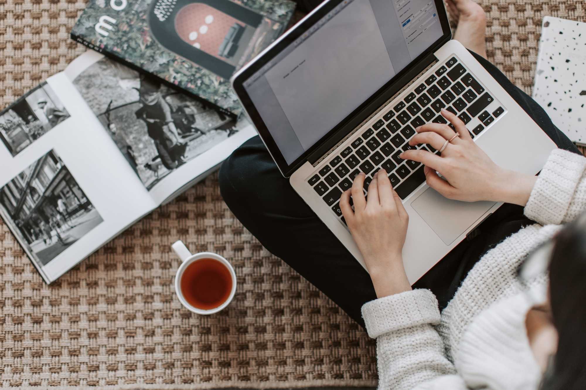 woman planning security measures using his laptop