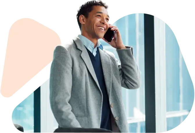 Businessman talking on phone in office