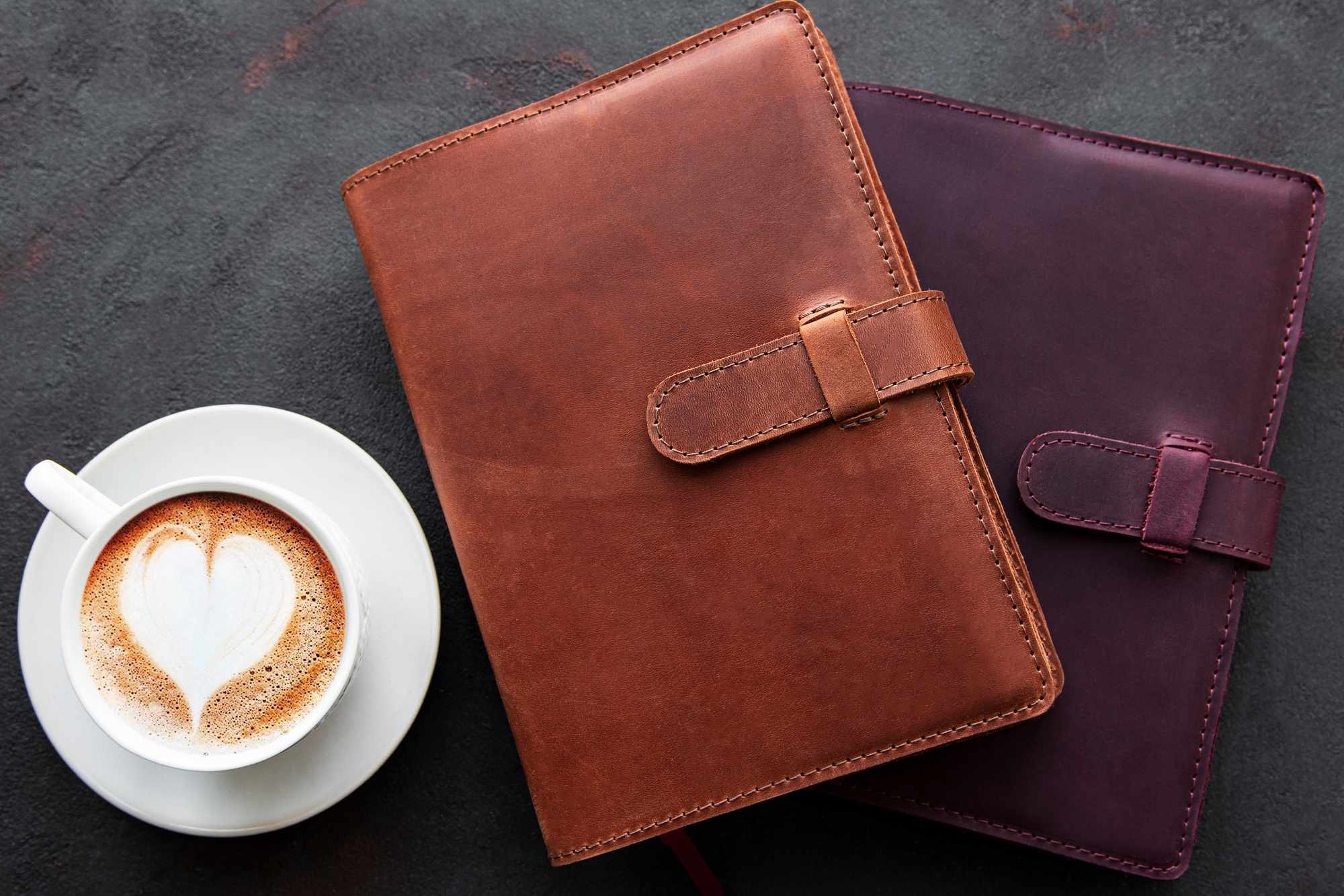 coffee and two notebooks