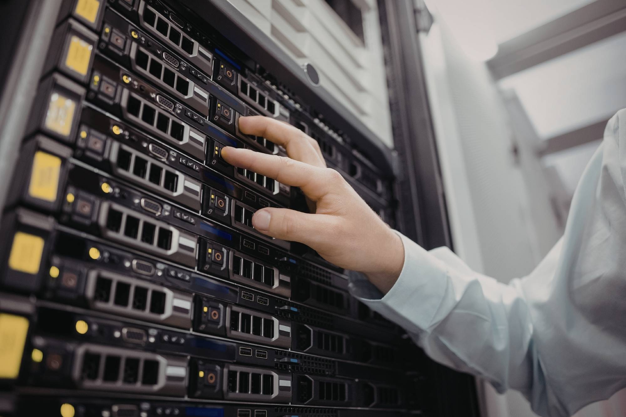 engineer checking data servers
