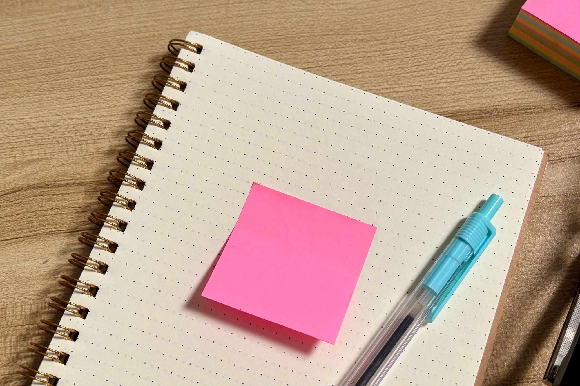 notebook pen and sticky notes