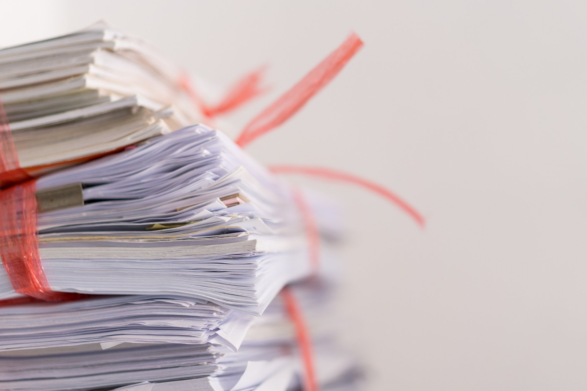 pile of compliance documents