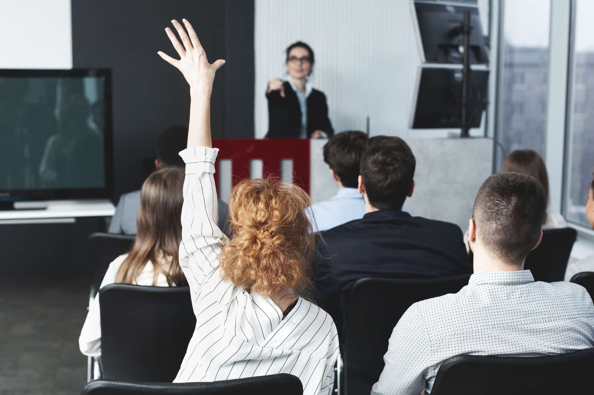 raising hand to ask question