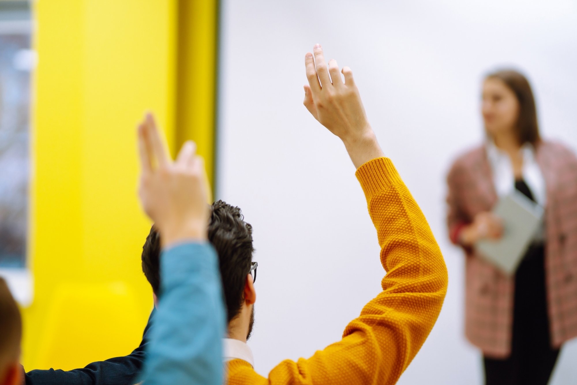 raising hands to ask questions
