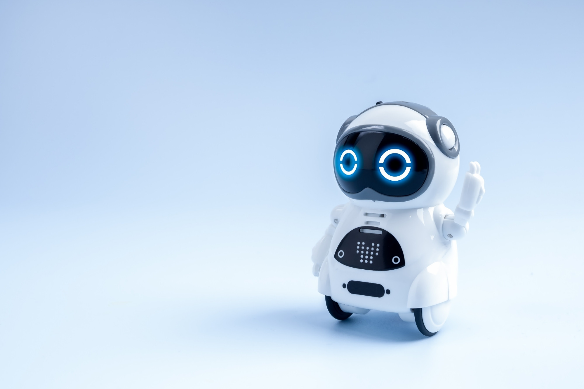 small robot raising its hand