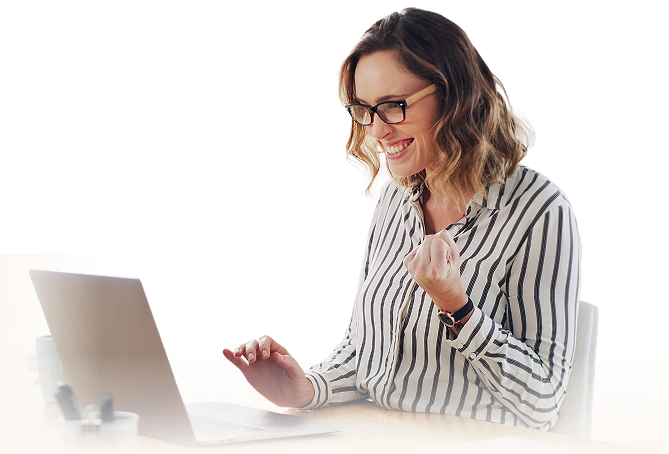 a happy woman using a laptop