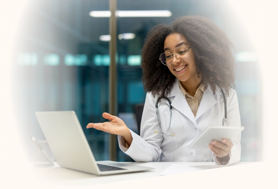Friendly female doctor consulting patients remotely
