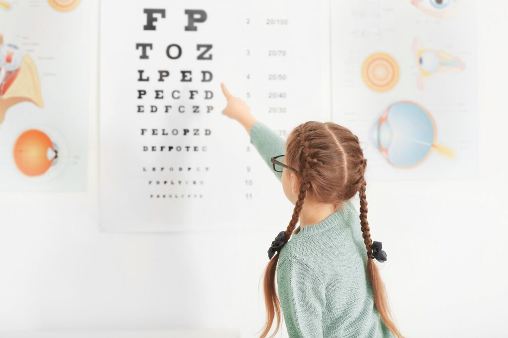 child-reading-an-eye-chart-test