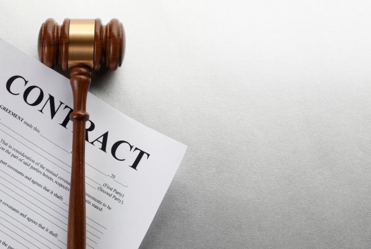 gavel on top of contract