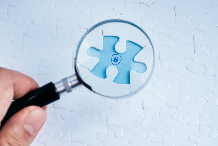 magnifying glass checking a puzzle pattern