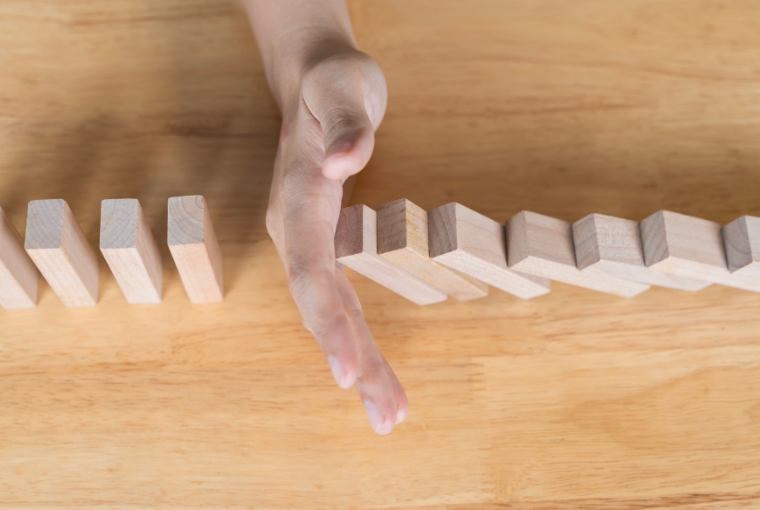 preventing wooden dominos to fall