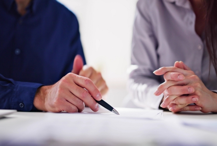 two people discussing business agreement